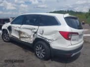 ✅ 2019 Honda Pilot EX-L • VIN: 5FNYF5H51KB008630 • Lot: 42966581. Listed on IAAI with 182,416 mi. Free auction sales archive from the USA and detailed vehicle history report at DreamBid. Image 3.