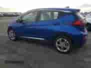 2019 Chevrolet Bolt EV LT z VIN 1G1FY6S05K4110341, wystawiony jako Copart lot #76903353 z przebiegiem 55 078 mil mil oraz . Historia ofert i sprzedaży dostępna na DreamBid. Obrazek 2.