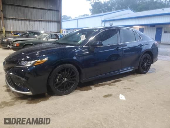 2021 Toyota Camry XSE с VIN 4T1K61AK1MU614806, выставлен на аукционе Copart как лот 70530875 с пробегом 121 057 миль миль и Списание • Salvage title. История ставок и продаж доступна на DreamBid. Изображение 1.