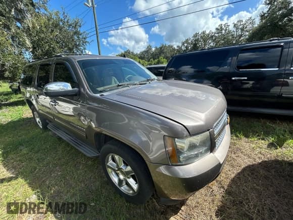✅ 2013 Chevrolet Suburban LT • VIN: 1GNSCJE02DR143930 • Lot: 86322005. Listed on Copart with 227,421 mi. Free auction sales archive from the USA and detailed vehicle history report at DreamBid. Image 1.