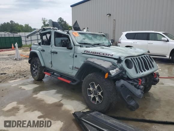 ✅ 2023 Jeep Wrangler Rubicon • VIN: 1C4HJXFG8PW601421 • Lot: 55970475. Listed on Copart with 46,743 mi. Free auction sales archive from the USA and detailed vehicle history report at DreamBid. Image 4.