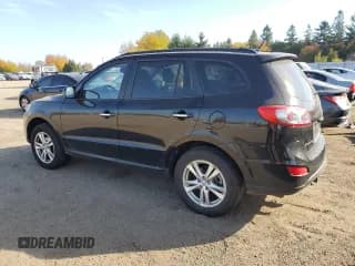 ✅ 2012 Hyundai Santa Fe SE • VIN: 5XYZHDAG4CG138089 • Lot: 77153944. Listed on Copart with 200,075 mi. Free auction sales archive from the USA and detailed vehicle history report at DreamBid. Image 2.