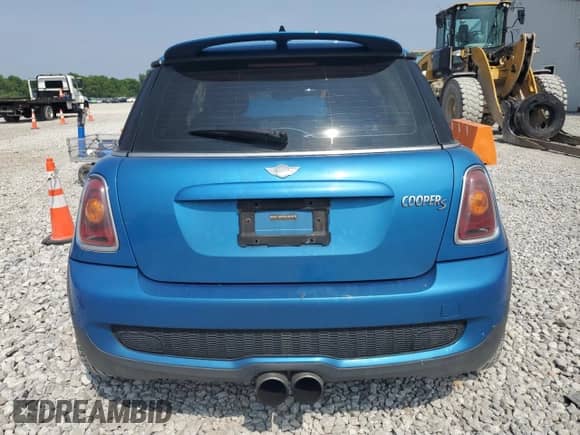2007 MINI Hardtop S with VIN WMWMF73547TT84449, listed as a Copart auction lot 60490995 with 157,602 mi miles and Salvage title. Bid and sale history available at DreamBid. Image 6.