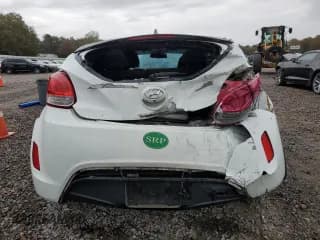 ✅ 2016 Hyundai Veloster • VIN: KMHTC6ADXGU278816 • Lot: 76687833. Wystawiony na Copart z przebiegiem 80 242 mil. Bezpłatny archiwum sprzedaży aukcyjnych z USA i szczegółowy raport historii pojazdu na DreamBid. Zdjęcie 6.
