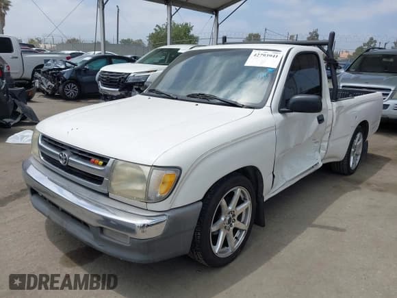 ✅ 1999 Toyota Tacoma • VIN: 4TANL42N8XZ400080 • Лот: 42793941. Опубликован ранее на IAAI с пробегом 292 501 миль. Бесплатный доступ к архиву аукционных продаж из США и подробный отчёт об истории автомобиля на DreamBid. Изображение 2.