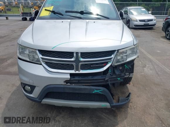 ✅ 2012 Dodge Journey SXT • VIN: 3C4PDCBGXCT324756 • Lot: 42422533. Listed on IAAI with 241,934 mi. Free auction sales archive from the USA and detailed vehicle history report at DreamBid. Image 12.