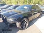 ✅ 2014 Dodge Charger Police • VIN: 2C3CDXAT3EH121230 • Lot: 42025638. Listed on IAAI with 48,224 mi. Free auction sales archive from the USA and detailed vehicle history report at DreamBid. Image 2.