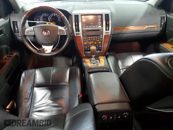 ✅ 2008 Cadillac STS AWD • VIN: 1G6DD67VX80168706 • Лот: 67594585. Опубликован ранее на Copart с пробегом 110 969 миль. Бесплатный доступ к архиву аукционных продаж из США и подробный отчёт об истории автомобиля на DreamBid. Изображение 8.