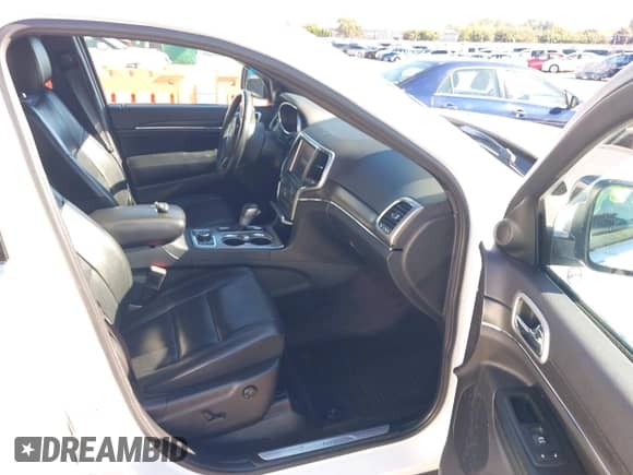 2018 Jeep Grand Cherokee Sterling z VIN 1C4RJFBGXJC267146, wystawiony jako IAAI lot #43411533 z przebiegiem 58 843 mil mil oraz . Historia ofert i sprzedaży dostępna na DreamBid. Obrazek 5.