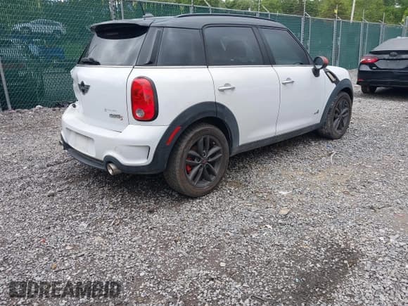 ✅ 2012 MINI Countryman S • VIN: WMWZC5C54CWL58610 • Lot: 42372195. Listed on IAAI with 133,556 mi. Free auction sales archive from the USA and detailed vehicle history report at DreamBid. Image 4.