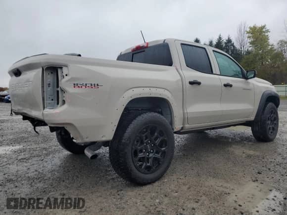 2026 Chevrolet Colorado 4WD Trail Boss с VIN 1GCPTEEK7T1107834, выставлен на аукционе Copart как лот 89877325 с пробегом 1 549 миль миль и Списание • Salvage title. История ставок и продаж доступна на DreamBid. Изображение 3.