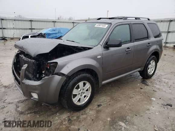 2009 Mercury Mariner z VIN 4M2CU81G39KJ17532, wystawiony jako Copart lot #43907455 z przebiegiem 214 212 mil mil oraz Szkoda całkowita • Salvage title. Historia ofert i sprzedaży dostępna na DreamBid. Obrazek 1.
