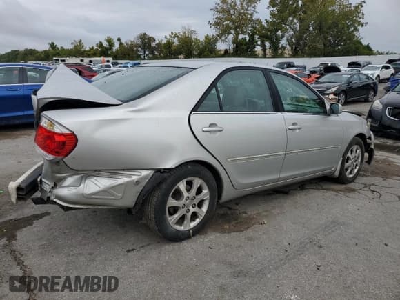 ✅ 2005 Toyota Camry XLE • VIN: 4T1BF32K35U606329 • Лот: 81746035. Опубликован ранее на Copart с пробегом 218 603 миль. Бесплатный доступ к архиву аукционных продаж из США и подробный отчёт об истории автомобиля на DreamBid. Изображение 3.