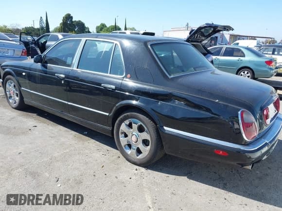 ✅ 2001 Bentley Arnage • VIN: SCBLC31E11CX06297 • Lot: 41980275. Wystawiony na IAAI z przebiegiem 63 510 mil. Bezpłatny archiwum sprzedaży aukcyjnych z USA i szczegółowy raport historii pojazdu na DreamBid. Zdjęcie 3.