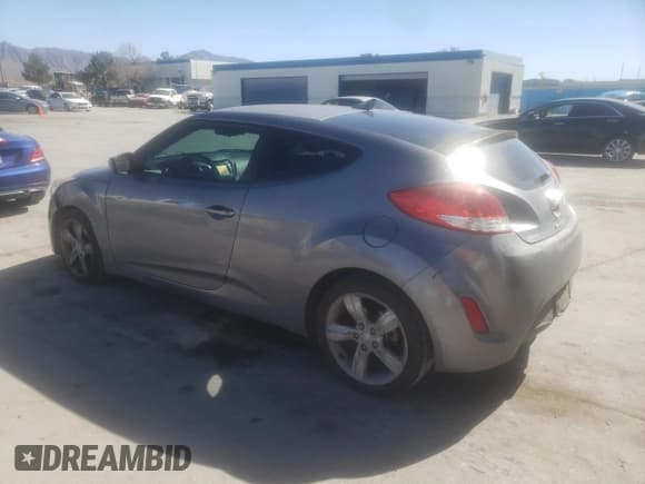 ✅ 2013 Hyundai Veloster w/Gray Int • VIN: KMHTC6AD6DU145434 • Lot: 43052704. Wystawiony na Copart z przebiegiem 106 055 mil. Bezpłatny archiwum sprzedaży aukcyjnych z USA i szczegółowy raport historii pojazdu na DreamBid. Zdjęcie 2.
