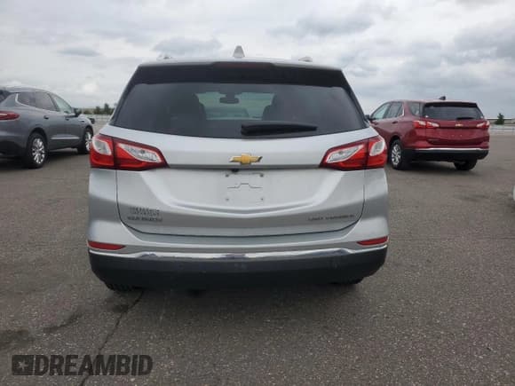 ✅ 2021 Chevrolet Equinox Premier • VIN: 3GNAXXEV3MS100029 • Lot: 59333805. Listed on Copart with 50,894 mi. Free auction sales archive from the USA and detailed vehicle history report at DreamBid. Image 6.