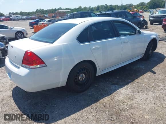 ✅ 2013 Chevrolet Impala Police • VIN: 2G1WD5E35D1221501 • Lot: 43269727. Listed on IAAI with 95,859 mi. Free auction sales archive from the USA and detailed vehicle history report at DreamBid. Image 4.