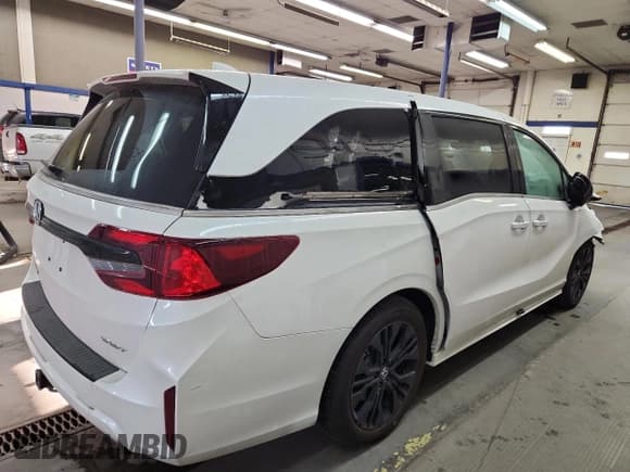 ✅ 2025 Honda Odyssey Sport-L • VIN: 5FNRL6H7XSB041033 • Лот: 93747315. Опубликован ранее на Copart с пробегом Не указан. Бесплатный доступ к архиву аукционных продаж из США и подробный отчёт об истории автомобиля на DreamBid. Изображение 3.