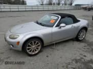 ✅ 2006 Mazda MX-5 Miata Touring • VIN: JM1NC25F560102313 • Лот: 46330245. Опубликован ранее на Copart с пробегом Не указан. Бесплатный доступ к архиву аукционных продаж из США и подробный отчёт об истории автомобиля на DreamBid. Изображение 1.