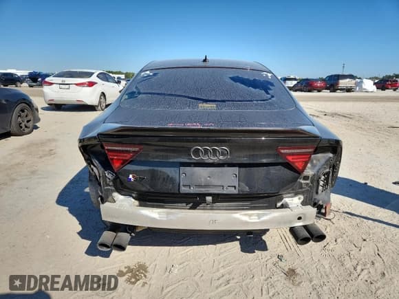 ✅ 2016 Audi S7 • VIN: WAUW2BFC9GN135490 • Лот: 91205115. Опубликован ранее на Copart с пробегом 113 980 миль. Бесплатный доступ к архиву аукционных продаж из США и подробный отчёт об истории автомобиля на DreamBid. Изображение 6.