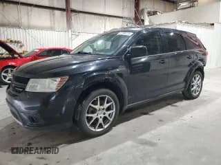 ✅ 2013 Dodge Journey R/T Rallye • VIN: 3C4PDDEG3DT590588 • Лот: 57388735. Опубликован ранее на Copart с пробегом 338 591 миль. Бесплатный доступ к архиву аукционных продаж из США и подробный отчёт об истории автомобиля на DreamBid. Изображение 1.