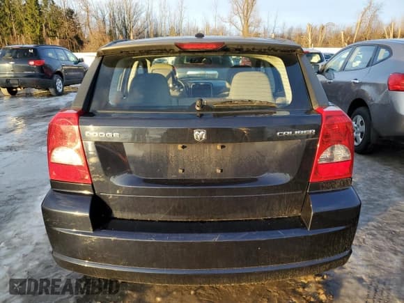 ✅ 2010 Dodge Caliber Mainstreet • VIN: 1B3CB3HAXAD648284 • Лот: 84856604. Опубликован ранее на Copart с пробегом 84 032 миль. Бесплатный доступ к архиву аукционных продаж из США и подробный отчёт об истории автомобиля на DreamBid. Изображение 6.