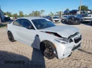 ✅ 2020 BMW M2 Competition • VIN: WBS2U7C01L7E29334 • Lot: 43299285. Listed on IAAI with 58,986 mi. Free auction sales archive from the USA and detailed vehicle history report at DreamBid. Image 1.