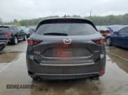 ✅ 2021 Mazda CX-5 Touring • VIN: JM3KFBCM0M1343321 • Lot: 85146695. Wystawiony na Copart z przebiegiem 69 031 mil. Bezpłatny archiwum sprzedaży aukcyjnych z USA i szczegółowy raport historii pojazdu na DreamBid. Zdjęcie 6.