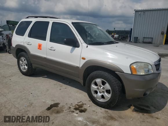✅ 2004 Mazda Tribute LX • VIN: 4F2YZ94184KM02567 • Lot: 67853765. Listed on Copart with 125,384 mi. Free auction sales archive from the USA and detailed vehicle history report at DreamBid. Image 4.