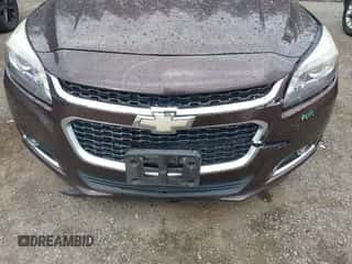 2015 Chevrolet Malibu LT z VIN 1G11D5SL0FF167535, wystawiony jako IAAI lot #43398139 z przebiegiem Nie podano mil oraz . Historia ofert i sprzedaży dostępna na DreamBid. Obrazek 6.