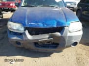 ✅ 2007 Ford Escape XLS • VIN: 1FMCU02Z47KA29556 • Lot: 43360641. Listed on IAAI with 144,730 mi. Free auction sales archive from the USA and detailed vehicle history report at DreamBid. Image 6.