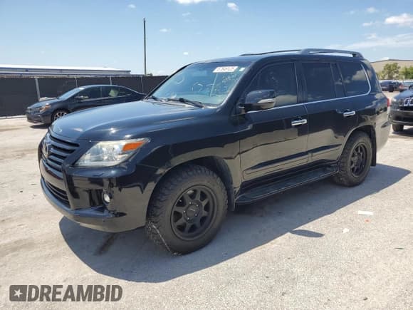 ✅ 2015 Lexus LX 570 • VIN: JTJHY7AX8F4173019 • Lot: 67849125. Listed on Copart with 199,237 mi. Free auction sales archive from the USA and detailed vehicle history report at DreamBid. Image 1.