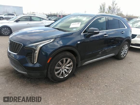 ✅ 2021 Cadillac XT4 FWD Premium Luxury • VIN: 1GYFZCR48MF004009 • Лот: 41956723. Опубликован ранее на IAAI с пробегом 82 483 миль. Бесплатный доступ к архиву аукционных продаж из США и подробный отчёт об истории автомобиля на DreamBid. Изображение 2.