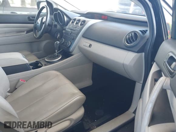 ✅ 2012 Mazda CX-7 i Touring • VIN: JM3ER2CMXC0421774 • Lot: 41743231. Wystawiony na IAAI z przebiegiem 132 488 mil. Bezpłatny archiwum sprzedaży aukcyjnych z USA i szczegółowy raport historii pojazdu na DreamBid. Zdjęcie 5.