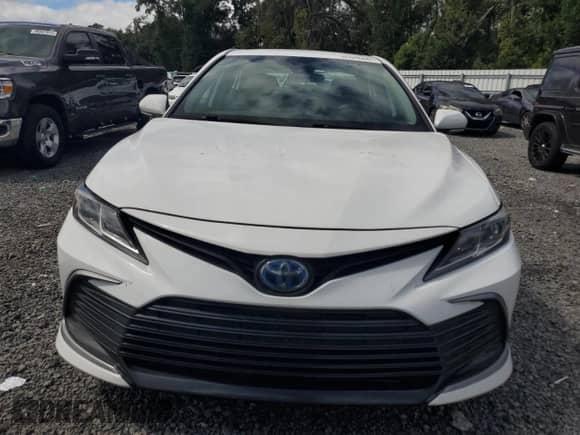 2021 Toyota Camry Hybrid LE with VIN 4T1C31AK3MU567856, listed as a Copart auction lot 86088445 with 264,446 mi miles and Clean title. Bid and sale history available at DreamBid. Image 5.