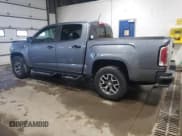 ✅ 2021 GMC Canyon 4WD AT4 • VIN: 1GTG6FEN1M1203936 • Лот: 56041315. Опубликован ранее на Copart с пробегом 54 939 миль. Бесплатный доступ к архиву аукционных продаж из США и подробный отчёт об истории автомобиля на DreamBid. Изображение 2.