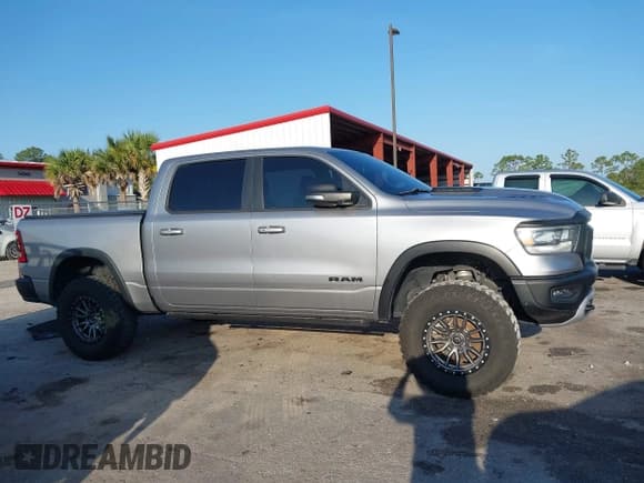 ✅ 2021 Ram 1500 Rebel • VIN: 1C6SRFLT3MN778445 • Lot: 42209255. Wystawiony na IAAI z przebiegiem 48 125 mil. Bezpłatny archiwum sprzedaży aukcyjnych z USA i szczegółowy raport historii pojazdu na DreamBid. Zdjęcie 13.