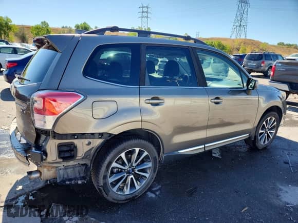 2018 Subaru Forester Touring z VIN JF2SJGWC8JH511119, wystawiony jako Copart lot #80750065 z przebiegiem 86 471 mil mil oraz Szkoda całkowita • Salvage title. Historia ofert i sprzedaży dostępna na DreamBid. Obrazek 3.