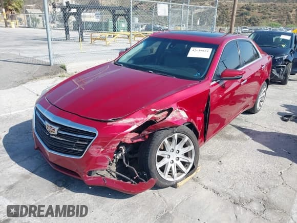 ✅ 2016 Cadillac CTS RWD • VIN: 1G6AP5SX4G0120789 • Lot: 42439834. Listed on IAAI with 112,050 mi. Free auction sales archive from the USA and detailed vehicle history report at DreamBid. Image 2.