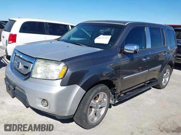 ✅ 2012 Honda Pilot EX-L • VIN: 5FNYF3H62CB022552 • Lot: 43556702. Listed on IAAI with 213,233 mi. Free auction sales archive from the USA and detailed vehicle history report at DreamBid. Image 2.