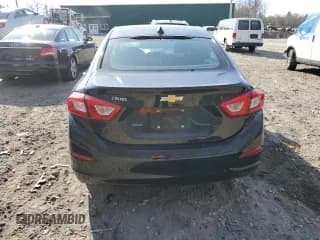 ✅ 2018 Chevrolet Cruze LS • VIN: 1G1BC5SM3J7126870 • Lot: 48811513. Listed on Copart with 82,306 mi. Free auction sales archive from the USA and detailed vehicle history report at DreamBid. Image 6.