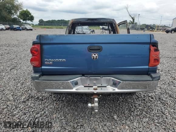 2005 Dodge Dakota SLT с VIN 1D7HE42K45S304962, выставлен на аукционе Copart как лот 69011065 с пробегом Не указан миль и На запчасти • Non repairable. История ставок и продаж доступна на DreamBid. Изображение 6.