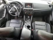 ✅ 2016 Mazda CX-5 Grand Touring • VIN: JM3KE4DY9G0830771 • Lot: 92123195. Listed on Copart with 65,975 mi. Free auction sales archive from the USA and detailed vehicle history report at DreamBid. Image 8.