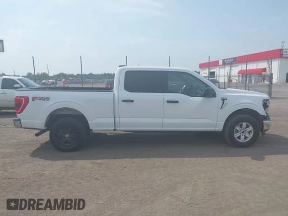 ✅ 2022 Ford F-150 XL • VIN: 1FTFW1E86NFB57498 • Lot: 43223589. Listed on IAAI with 63,536 mi. Free auction sales archive from the USA and detailed vehicle history report at DreamBid. Image 13.