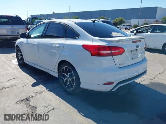 ✅ 2015 Ford Focus SE • VIN: 1FADP3FEXFL221801 • Lot: 43492285. Listed on IAAI with 57,155 mi. Free auction sales archive from the USA and detailed vehicle history report at DreamBid. Image 3.