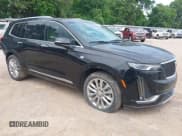 ✅ 2022 Cadillac XT6 Premium Luxury • VIN: 1GYKPCRS3NZ126862 • Lot: 42146854. Listed on IAAI with 52,804 mi. Free auction sales archive from the USA and detailed vehicle history report at DreamBid. Image 1.