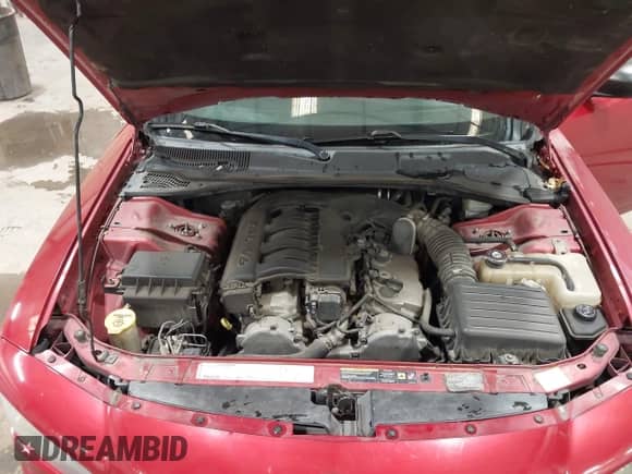 2006 Dodge Charger z VIN 2B3KA43G86H251859, wystawiony jako IAAI lot #43544502 z przebiegiem 110 548 mil mil oraz . Historia ofert i sprzedaży dostępna na DreamBid. Obrazek 10.