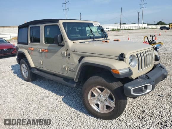 ✅ 2022 Jeep Wrangler Unlimited Sahara Altitude • VIN: 1C4HJXEG9NW269407 • Lot: 66686385. Listed on Copart with 30,682 mi. Free auction sales archive from the USA and detailed vehicle history report at DreamBid. Image 4.