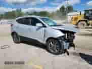 2014 Hyundai Tucson SE z VIN KM8JU3AG7EU803034, wystawiony jako Copart lot #70328775 z przebiegiem 126 877 mil mil oraz Szkoda całkowita • Salvage title. Historia ofert i sprzedaży dostępna na DreamBid. Obrazek 4.
