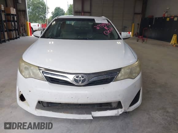 2013 Toyota Camry L with VIN 4T4BF1FK9DR293452, listed as a IAAI auction lot 42876325 with 225,034 mi miles and . Bid and sale history available at DreamBid. Image 12.